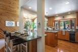Experience the perfect blend of rustic charm and modern convenience in this stunning kitchen and dining area.