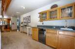This spacious home features a well-appointed wet bar area, perfect for entertaining guests.