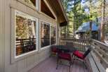 Enjoy your morning coffee or evening drinks on this charming deck, complete with a wrought iron table and chairs.