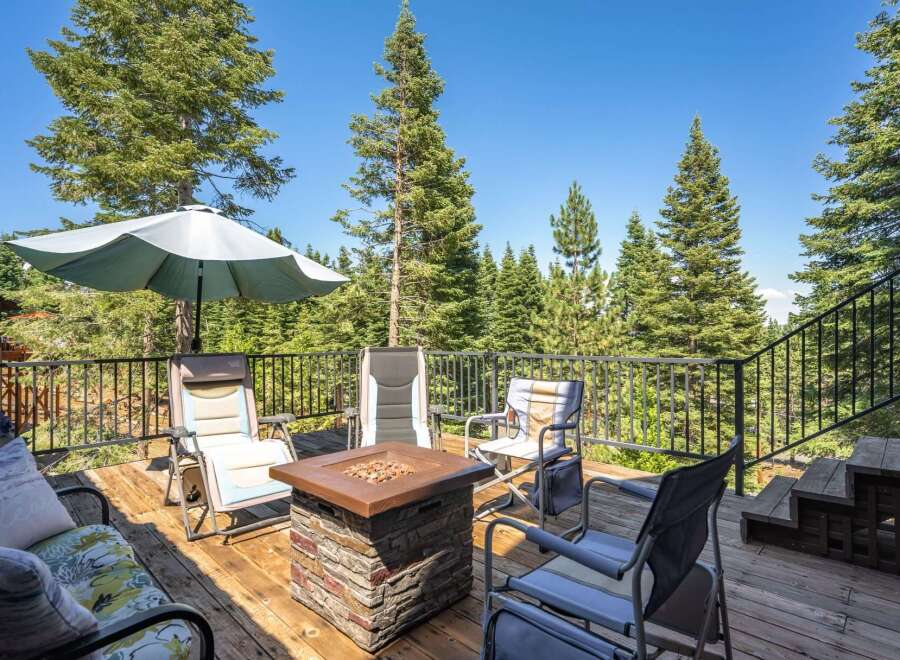 Enjoy the serene mountain views from this spacious deck, perfect for outdoor entertaining.