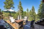 Enjoy the serene mountain views from this spacious deck, perfect for outdoor entertaining.