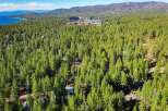 Nestled amidst a dense forest of towering pine trees, this property offers a serene and private retreat.