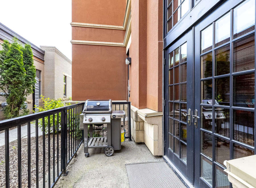 Enjoy outdoor living on this charming patio, perfect for entertaining.