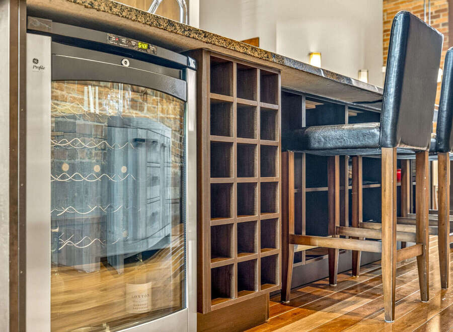 Experience sophisticated entertaining with this built-in wine cooler, perfect for keeping your favorite vintages at the ideal temperature.