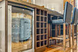 Experience sophisticated entertaining with this built-in wine cooler, perfect for keeping your favorite vintages at the ideal temperature.