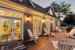 Experience luxurious outdoor living on this expansive deck, perfect for entertaining or relaxing.