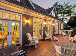 Experience luxurious outdoor living on this expansive deck, perfect for entertaining or relaxing.