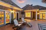 Experience seamless indoor-outdoor living with this expansive deck, perfect for entertaining or relaxing.