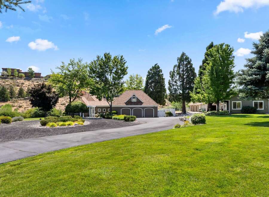 Discover this stunning property featuring a spacious three-car garage and a charming detached guest house, perfect for visitors or rental income.