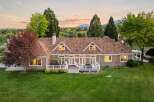 Experience luxurious living in this stunning home featuring a spacious deck perfect for entertaining and enjoying the serene sunset views.