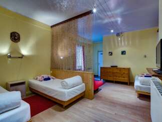 This charming room features two twin beds, perfect for accommodating guests or family.