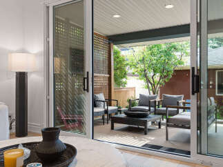 Step outside to a beautifully appointed covered patio, perfect for al fresco dining or relaxing with loved ones.