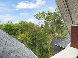 Enjoy the lush greenery and clear blue skies from this property's vantage point.