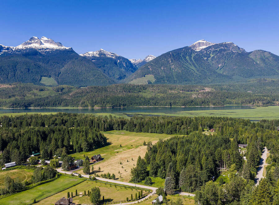 Discover your dream home nestled amidst breathtaking mountain scenery and lush forests.