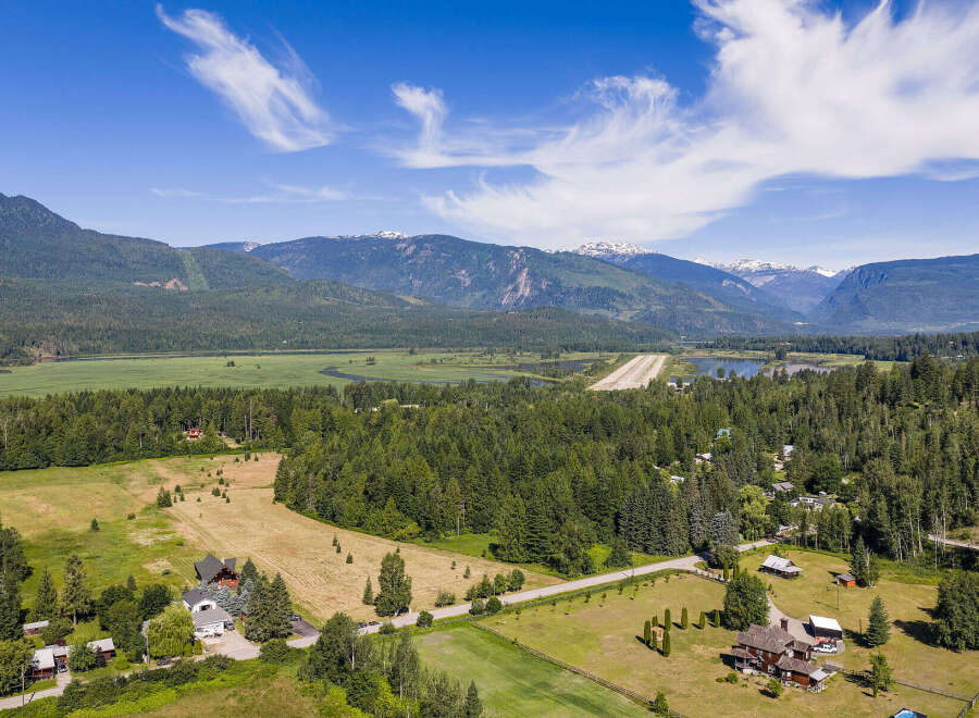 Experience breathtaking mountain views and serene natural beauty from this expansive property.