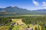Discover this stunning rural property offering breathtaking mountain views and serene lake access.