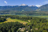 Discover this stunning property offering breathtaking mountain views and serene lake access.
