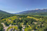 Discover this stunning property nestled in a picturesque valley, offering breathtaking mountain views and serene lake vistas.