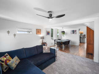 Step into this inviting open-concept living and dining area, perfect for entertaining.