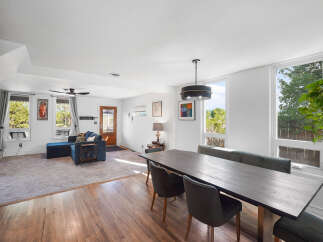 Experience open-concept living in this beautifully appointed dining and living area.