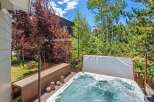 Relax and unwind in this luxurious hot tub, perfect for soaking up the mountain views.