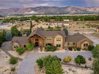 Discover this stunning custom-built home offering unparalleled luxury and breathtaking mountain views.