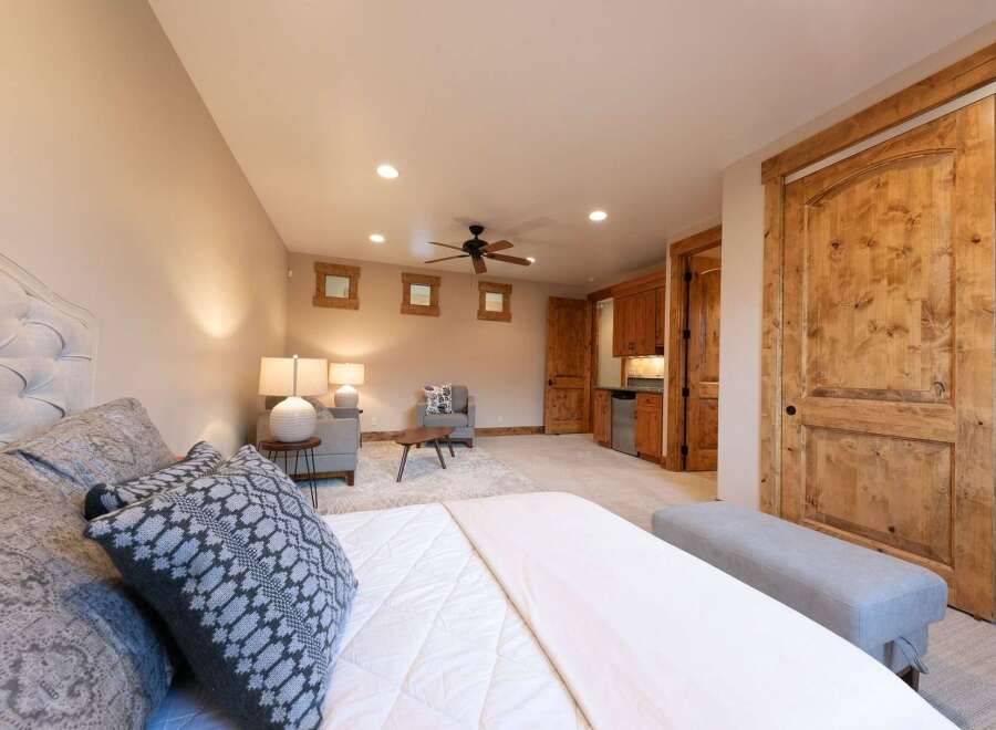 Experience rustic charm and modern comfort in this beautifully appointed bedroom.