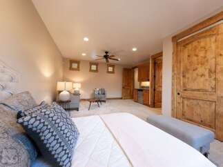 Experience rustic charm and modern comfort in this beautifully appointed bedroom.