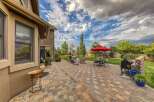 Enjoy outdoor living at its finest on this expansive paver patio, perfect for entertaining.