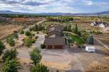 Discover this stunning property offering breathtaking panoramic views of the surrounding mountains and valley.
