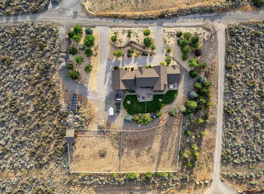 Discover this stunning property featuring a spacious home with a well-maintained backyard, perfect for outdoor entertaining.