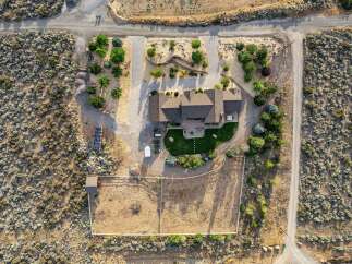 Discover this stunning property featuring a spacious home with a well-maintained backyard, perfect for outdoor entertaining.