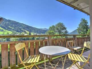 Enjoy breathtaking mountain views from this charming balcony, perfect for your morning coffee or evening relaxation.