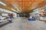 Discover this expansive workshop space, perfect for your business or hobby needs.