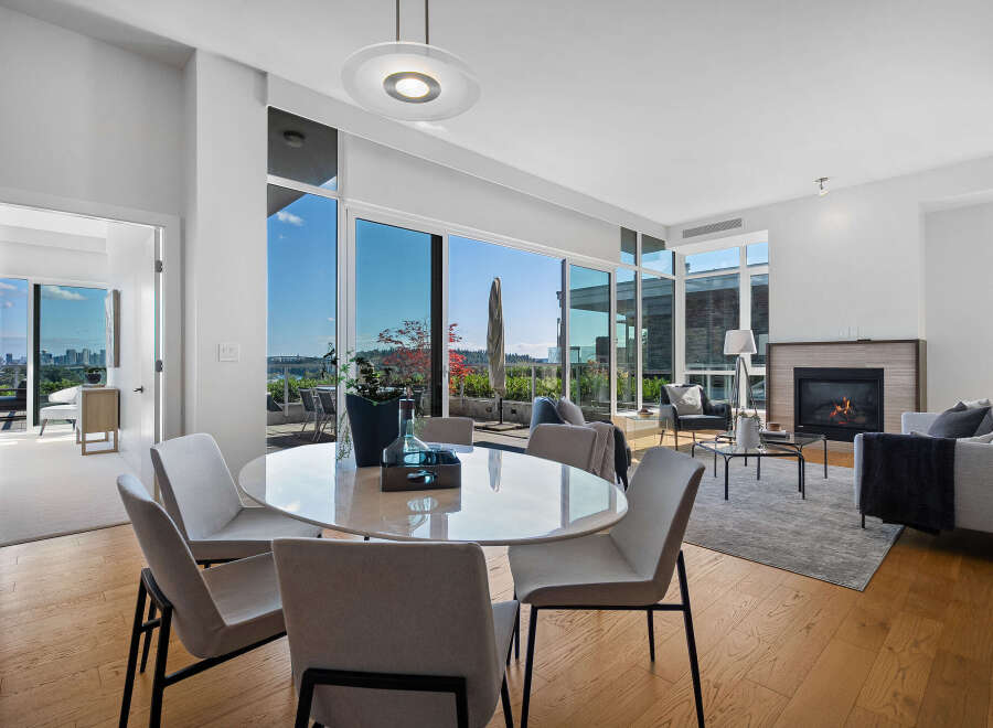 Experience luxurious urban living in this stunning condo featuring a spacious open-concept living and dining area.