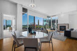 Experience luxurious urban living in this stunning condo featuring a spacious open-concept living and dining area.