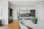 Experience modern luxury in this stunning open-concept kitchen and dining area.