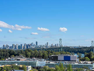 Experience the best of urban living with this stunning property offering panoramic views of the Vancouver skyline and the iconic Lions Gate Bridge.
