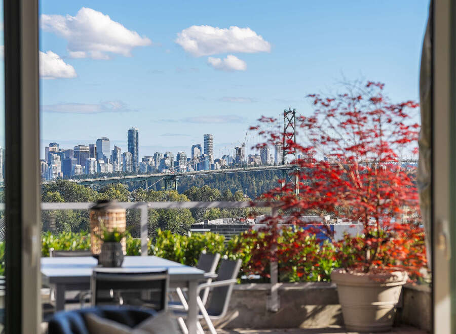 Experience breathtaking city and water views from this stunning property's expansive balcony.