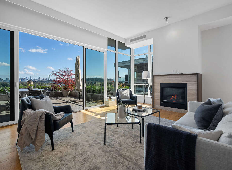Experience luxurious living with this stunning condo featuring expansive floor-to-ceiling windows that offer breathtaking city and water views.