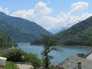 Experience breathtaking mountain and lake views from this stunning property, perfect for those seeking tranquility and natural beauty.