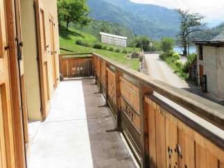 Enjoy breathtaking mountain views from this charming balcony, perfect for your morning coffee or evening relaxation.
