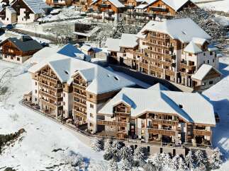 Experience luxury mountain living in this stunning alpine property, featuring modern architecture seamlessly integrated with traditional chalet design.