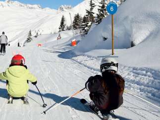 Experience the thrill of skiing down pristine slopes with breathtaking mountain views.