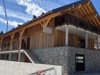 Discover this stunning new construction featuring a beautiful timber-framed exterior and a durable stone foundation.