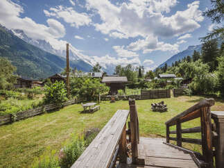 Experience the charm of alpine living with this picturesque property nestled amidst breathtaking mountain scenery.