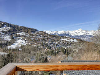 Experience breathtaking mountain views from this stunning property, nestled in a picturesque alpine village.