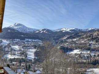 Experience breathtaking mountain views from this charming property nestled in a picturesque alpine village.