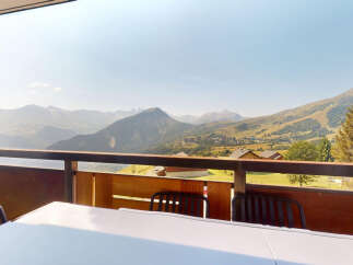 Enjoy breathtaking mountain views from this stunning property's balcony, perfect for morning coffee or evening relaxation.