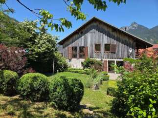 Nestled amidst lush greenery and rolling hills, this charming rustic property offers a serene escape.